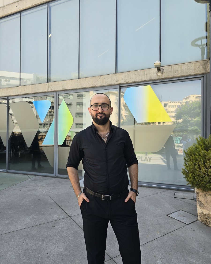 Mhamad El Itawi standing outside a tech venue in Beirut